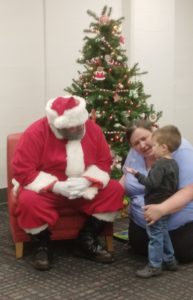 santa, miss catie, and child talking