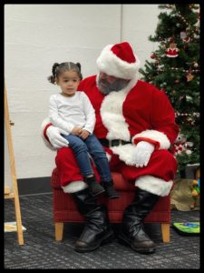 W telling Santa what she wants for Christmas