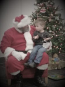 C telling Santa what he wants for Christmas