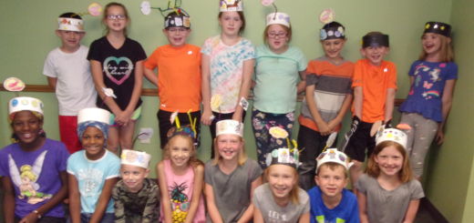 Warsaw children modeling their Party Planet Hats