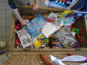 wicker chest full of toys for prizes