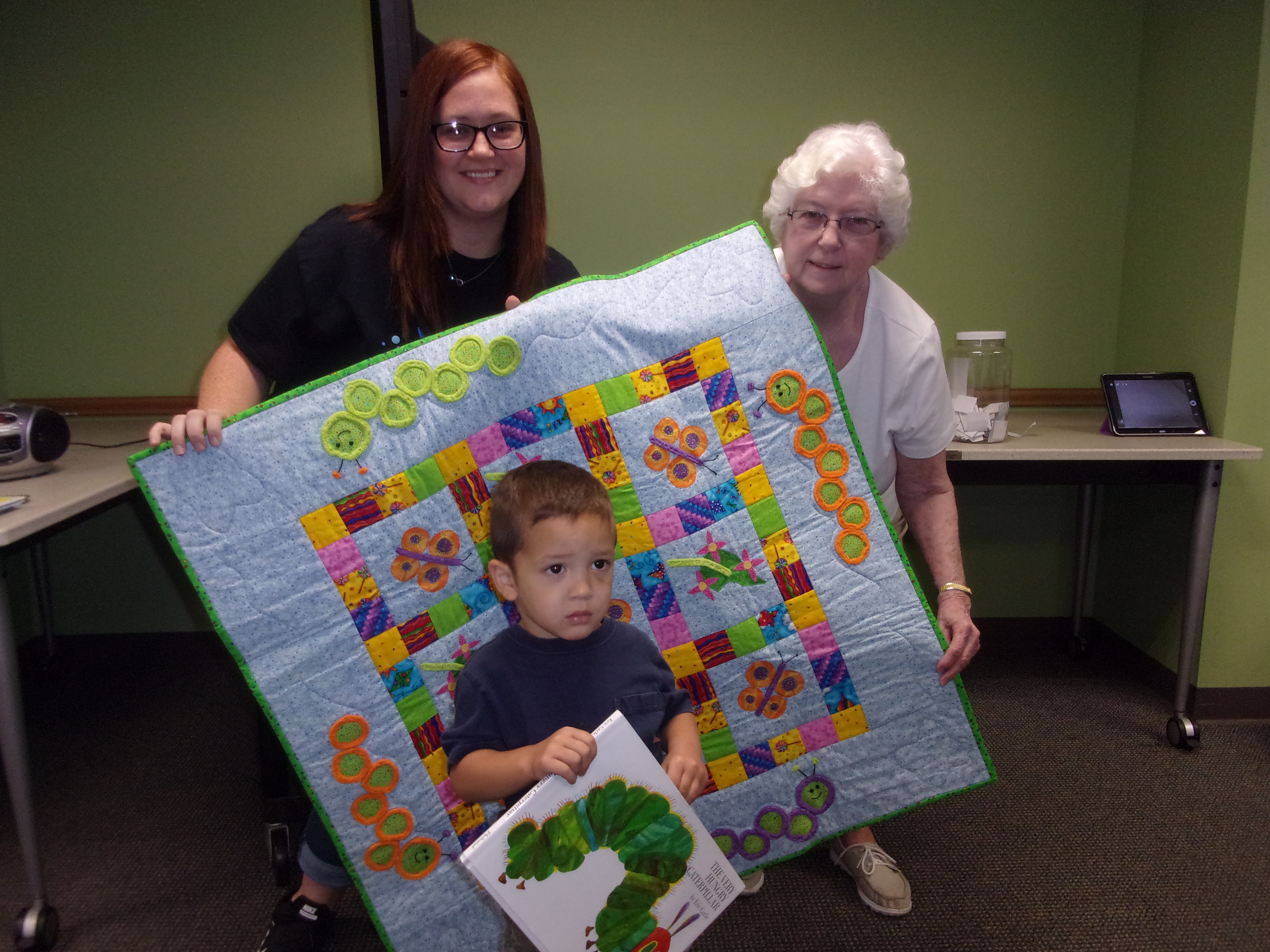 Warsaw Story Time Winner of quilt and book